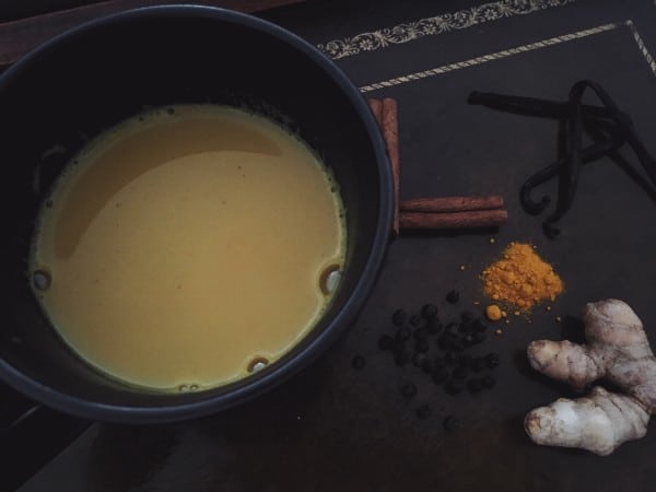 a mug of golden milk with turmeric